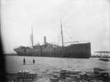 Historic picture of large ship in the port