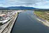 View upriver to harbour wharves at a river port