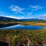 Water reservoir with mountains in the background